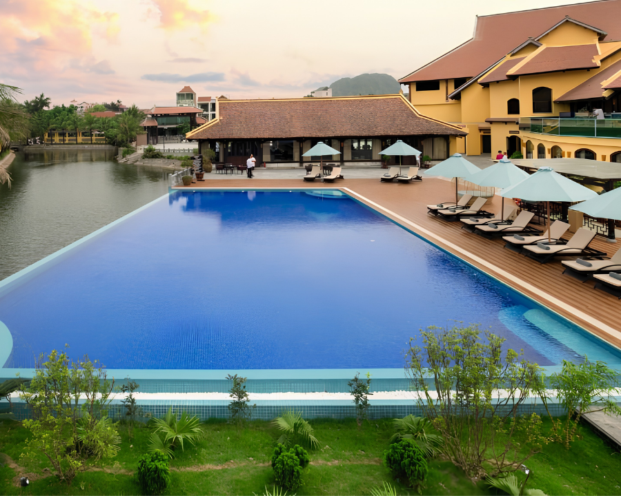 Emeralda Resort infinity pool overlooking the karst landscape.